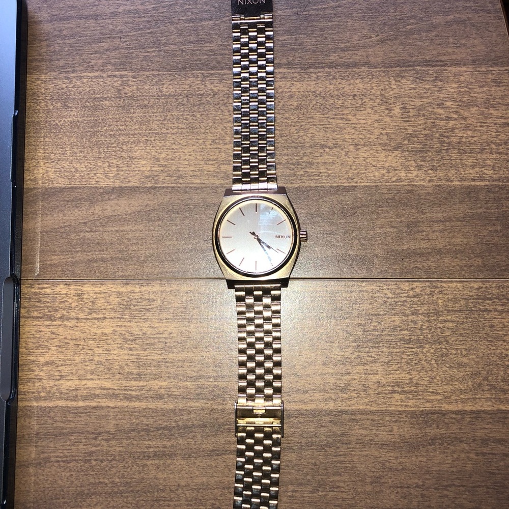 Rose Gold and Black Nixon Watches